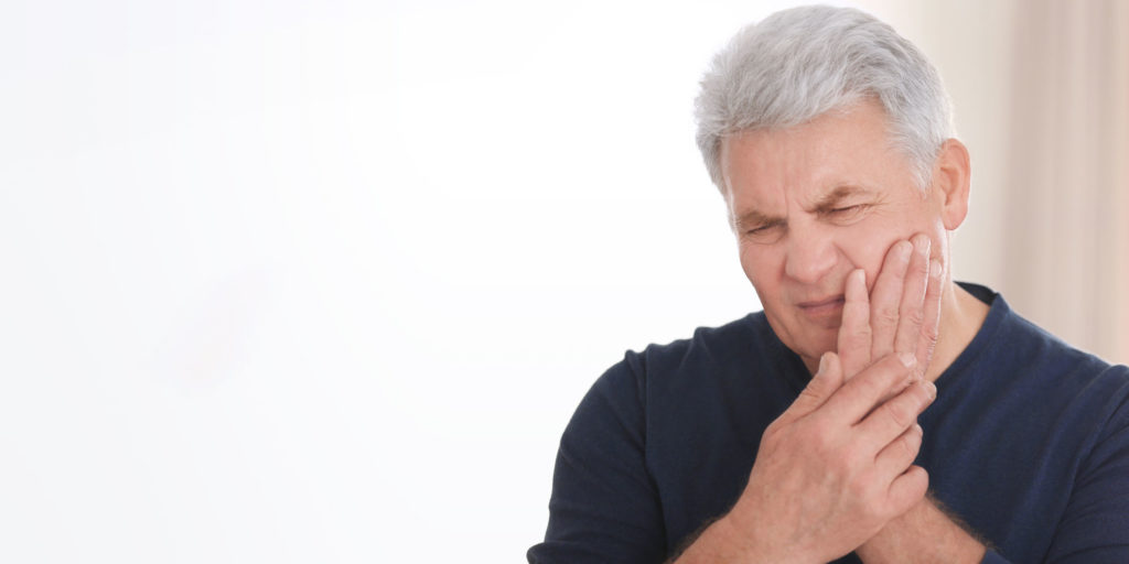 dental patient suffering from peri-implantitis