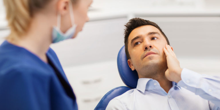 dental patient with tooth pain