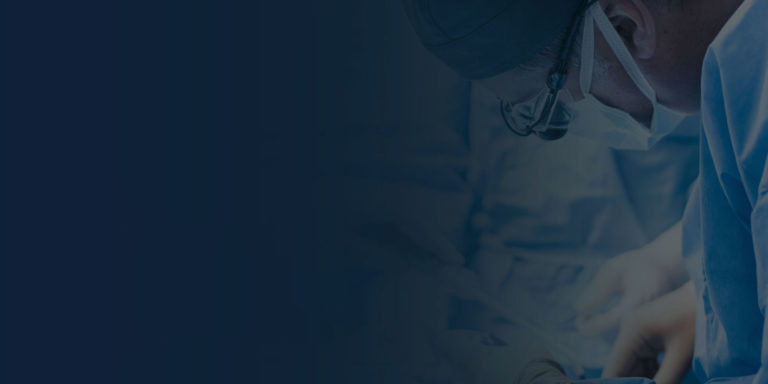 oral surgeon performing dental procedure