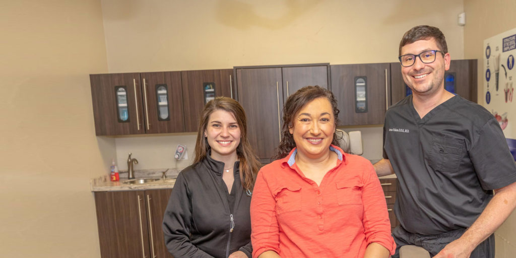 dr vickers and dental patient smiling