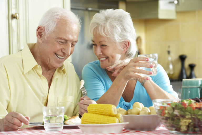 Implant Supported Denture Patient Smiling