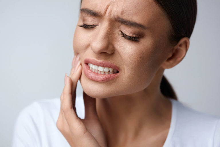 Dental Patient Suffering From Tooth Pain
