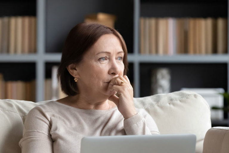 Dental Patient Wondering If She Should Get Dental Implants Or Dentures in Flower Mound, TX