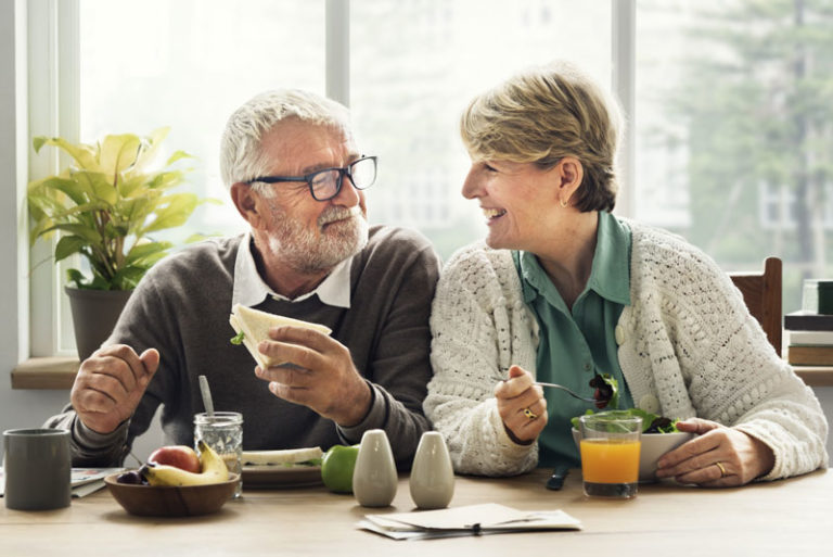 Dental Implant Patients Eating Together In Denton, TX