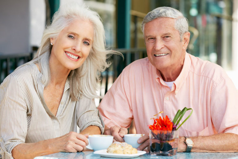 Dental Implant Patients Eating Together With Their False Teeth in Flower Mound, TX