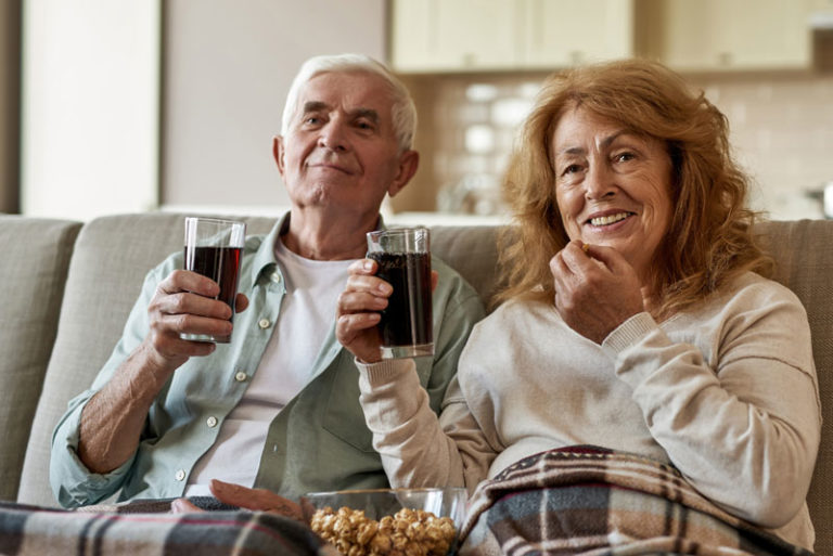 Dental Patients Eating And Drinking Using Their All On 4 Dental Implants