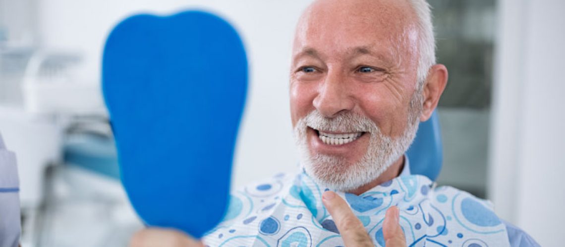 Dental Implant Patient Smiling After Procedure