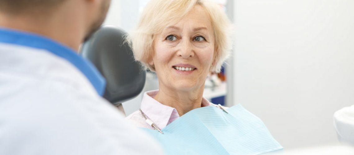 Dental Patient Getting Taught About Dental Implants