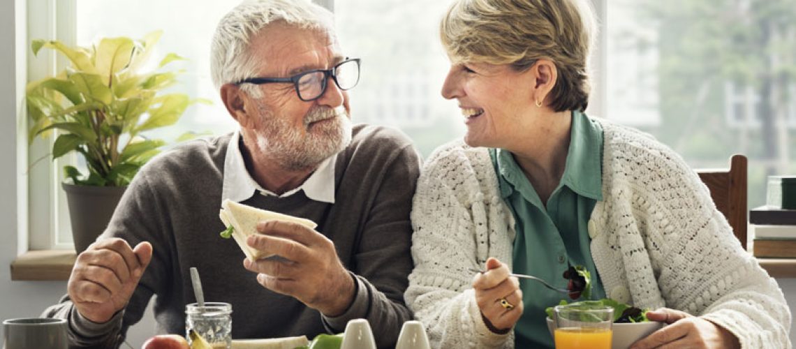 Dental Implant Patients Eating Together In Denton, TX