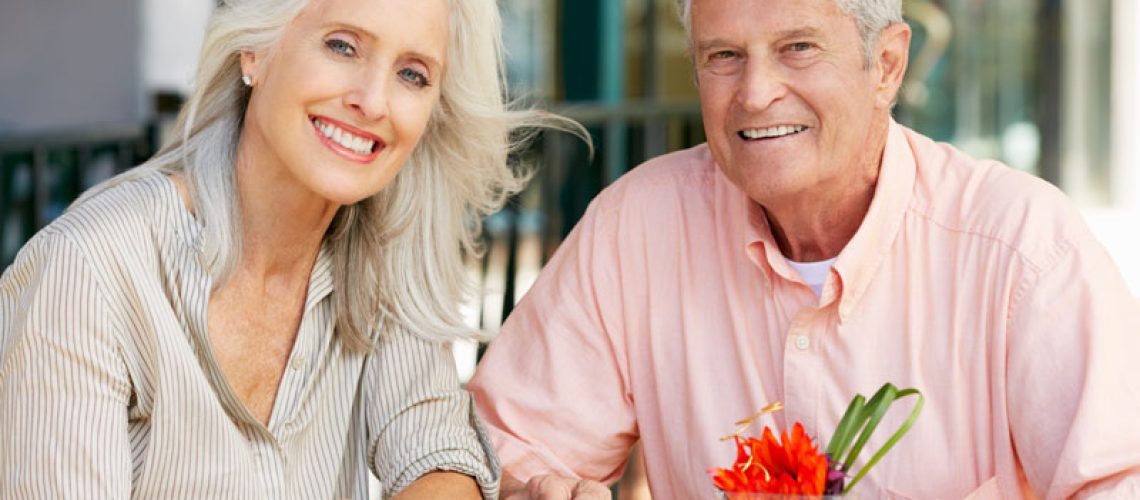 Dental Implant Patients Eating Together With Their False Teeth in Flower Mound, TX