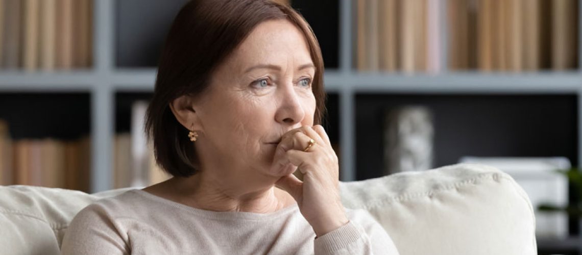 Dental Patient Wondering If She Should Get Dental Implants Or Dentures in Flower Mound, TX